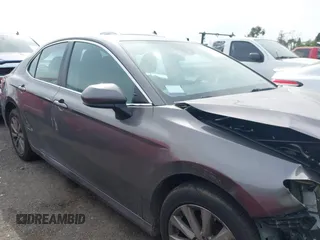 2019 Toyota Camry LE with VIN 4T1B11HK4KU254853, listed as a IAAI auction lot 42013255 with 153,664 mi miles and . Bid and sale history available at DreamBid. Image 13.