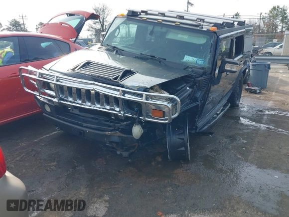 2006 Hummer H2 with VIN 5GRGN23U06H113353, listed as a IAAI auction lot 41476649 with 165,370 mi miles. Bid and sale history available at carsss.com. Image 6.
