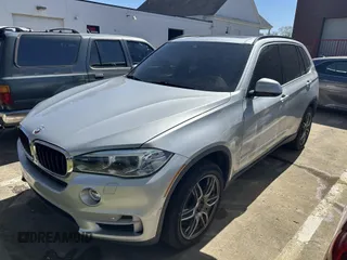 2015 BMW X5 xDrive35i with VIN 5UXKR0C57F0P14432, listed as a IAAI auction lot 42076389 with 119,109 mi miles. Bid and sale history available at carsss.com. Image 2.
