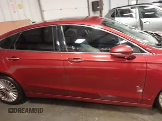 2014 Ford Fusion Titanium with VIN 3FA6P0K97ER324027, listed as a IAAI auction lot 41327141 with 161,045 mi miles and . Bid and sale history available at DreamBid. Image 13.