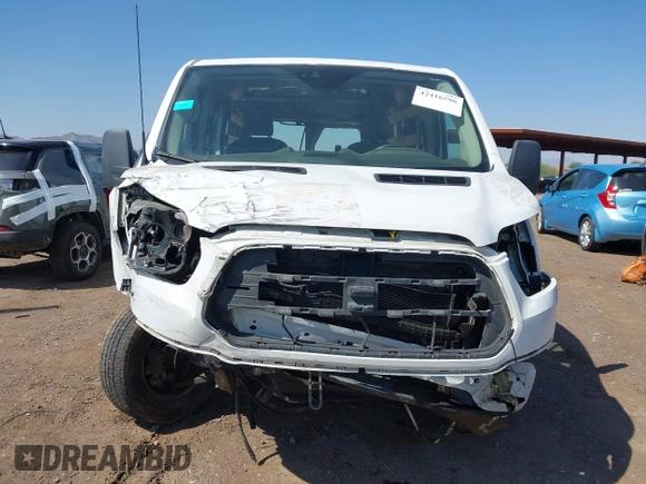 2018 Ford Transit z VIN 1FTYR1ZM2JKA64616, wystawiony jako IAAI lot #42416596 z przebiegiem Nie podano mil oraz . Historia ofert i sprzedaży dostępna na DreamBid. Obrazek 12.