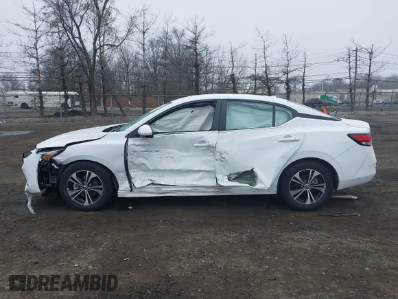 2022 Nissan Sentra SV z VIN 3N1AB8CV3NY307506, wystawiony jako IAAI lot #41830376 z przebiegiem 6 899 mil mil oraz . Historia ofert i sprzedaży dostępna na DreamBid. Obrazek 14.