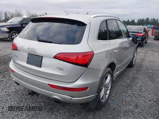 2013 Audi Q5 Premium Plus z VIN WA1LFAFPXDA060982, wystawiony jako IAAI lot #41507224 z przebiegiem 63 974 mil mil oraz . Historia ofert i sprzedaży dostępna na DreamBid. Obrazek 4.