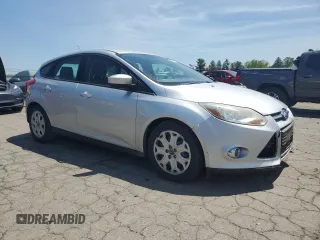 2012 Ford Focus SE z VIN 1FAHP3K2XCL270196, wystawiony jako Copart lot #57319575 z przebiegiem 80 364 mil mil oraz Szkoda całkowita • Salvage title. Historia ofert i sprzedaży dostępna na DreamBid. Obrazek 4.