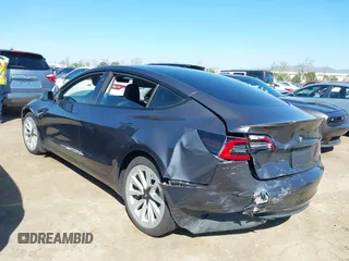 2021 Tesla Model 3 Long Range with VIN 5YJ3E1EB9MF997442, listed as a IAAI auction lot 41759875 with 87,059 mi miles. Bid and sale history available at carsss.com. Image 6.