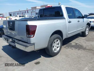 2012 Nissan Titan SV with VIN 1N6BA0EK5CN312092, listed as a IAAI auction lot 41881794 with 65,673 mi miles. Bid and sale history available at carsss.com. Image 4.