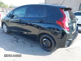 2015 Honda Fit LX with VIN 3HGGK5G5XFM737172, listed as a IAAI auction lot 42053332 with 80,690 mi miles and . Bid and sale history available at carsss.com. Image 3.