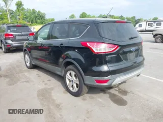 2016 Ford Escape SE with VIN 1FMCU0G73GUA91025, listed as a IAAI auction lot 42100978 with 164,241 mi miles. Bid and sale history available at carsss.com. Image 3.