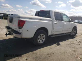 2005 Nissan Titan SE with VIN 1N6BA07B45N557451, listed as a Copart auction lot 80077824 with Not Provided miles and Salvage Title. Bid and sale history available at DreamBid. Image 3.