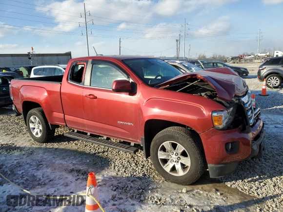 2015 GMC Canyon 4WD SLE with VIN 1GTH6BE3XF1180185, listed as a Copart auction lot 89046915 with 0 mi miles and Salvage Title. Bid and sale history available at carsss.com. Image 4.