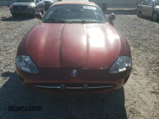 1999 Jaguar XK z VIN SAJGX2043XC032962, wystawiony jako Copart lot #49312155 z przebiegiem 74 662 mil mil oraz Szkoda całkowita • Salvage title. Historia ofert i sprzedaży dostępna na DreamBid. Obrazek 5.