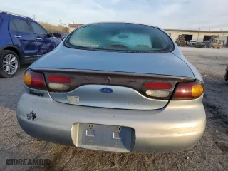 1997 Ford Taurus G with VIN 1FALP51U8VA192556, listed as a Copart auction lot 77604464 with 114,830 mi miles and Salvage Title. Bid and sale history available at carsss.com. Image 6.