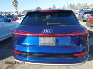 2021 Audi e-tron Premium with VIN WA1AAAGE4MB014383, listed as a IAAI auction lot 41298787 with 63,214 mi miles. Bid and sale history available at carsss.com. Image 17.