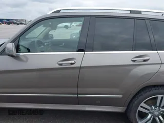 2014 Mercedes-Benz GLK 350 with VIN WDCGG5HB0EG326077, listed as a IAAI auction lot 42041401 with 122,087 mi miles and . Bid and sale history available at DreamBid. Image 14.