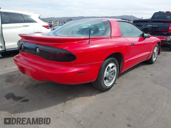 1995 Pontiac Firebird Firebird z VIN 2G2FS22S6S2206931, wystawiony jako IAAI lot #41732961 z przebiegiem 99 849 mil mil oraz . Historia ofert i sprzedaży dostępna na DreamBid. Obrazek 4.