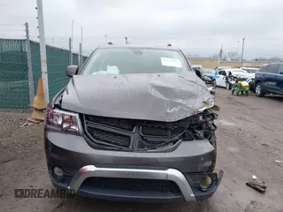 2020 Dodge Journey Crossroad z VIN 3C4PDCGB4LT271100, wystawiony jako IAAI lot #41552975 z przebiegiem 74 400 mil mil oraz . Historia ofert i sprzedaży dostępna na DreamBid. Obrazek 6.