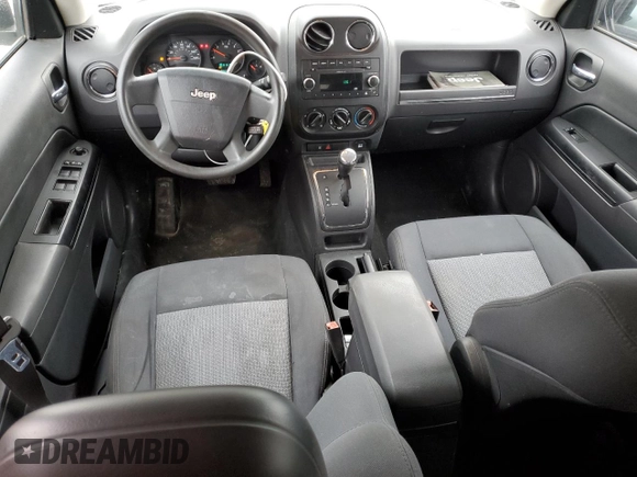2009 Jeep Patriot Sport z VIN 1J4FF28B39D249631, wystawiony jako Copart lot #55471465 z przebiegiem 130 667 mil mil oraz Czysty tytuł • Clean title. Historia ofert i sprzedaży dostępna na DreamBid. Obrazek 8.