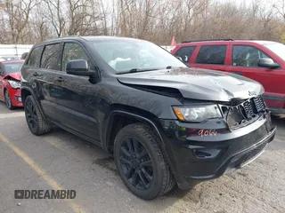 2017 Jeep Grand Cherokee Laredo with VIN 1C4RJFAG7HC873211, listed as a IAAI auction lot 40849066 with 139,430 mi miles. Bid and sale history available at carsss.com. Image 1.