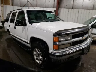 1999 Chevrolet Tahoe Z71 with VIN 1GNEK13R4XJ356365, listed as a Copart auction lot 49849285 with 187,701 mi miles and Salvage Title. Bid and sale history available at carsss.com. Image 4.