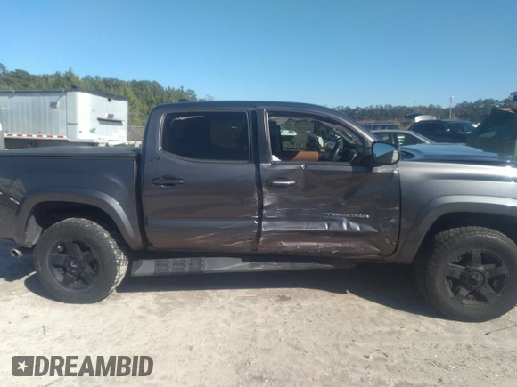 2018 Toyota Tacoma SR5 with VIN 5TFAZ5CN0JX056706, listed as a IAAI auction lot 41774141 with 31,738 mi miles and . Bid and sale history available at DreamBid. Image 13.