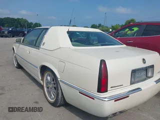 2001 Cadillac Eldorado ESC with VIN 1G6EL12Y01B104230, listed as a IAAI auction lot 42521397 with 60,570 mi miles and . Bid and sale history available at DreamBid. Image 3.