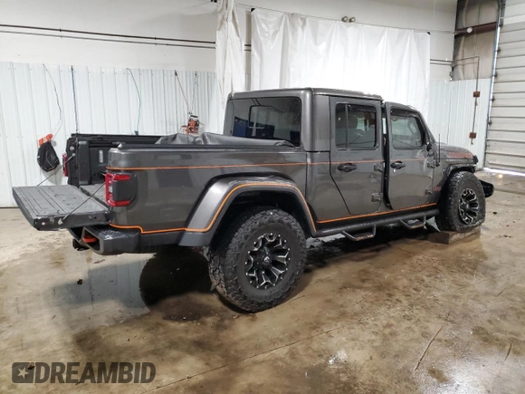 2023 Jeep Gladiator Mojave with VIN 1C6JJTEG4PL575386, listed as a Copart auction lot 45464735 with 17,572 mi miles and Salvage title. Bid and sale history available at DreamBid. Image 3.