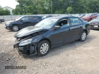 2014 Volkswagen Jetta S with VIN 3VW2K7AJXEM385605, listed as a Copart auction lot 64017495 with Not provided miles and Salvage title. Bid and sale history available at DreamBid. Image 1.
