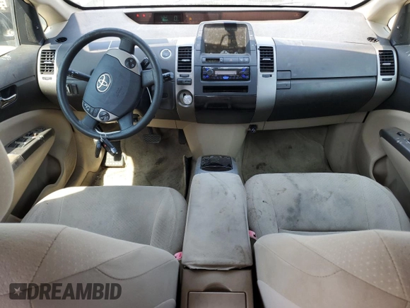 2005 Toyota Prius z VIN JTDKB20U057057671, wystawiony jako Copart lot #59898485 z przebiegiem 198 342 mil mil oraz Szkoda całkowita • Salvage title. Historia ofert i sprzedaży dostępna na DreamBid. Obrazek 8.