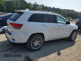 2014 Jeep Grand Cherokee Summit with VIN 1C4RJFJG9EC474781, listed as a Copart auction lot 60720325 with 64,546 mi miles and Salvage title. Bid and sale history available at DreamBid. Image 3.