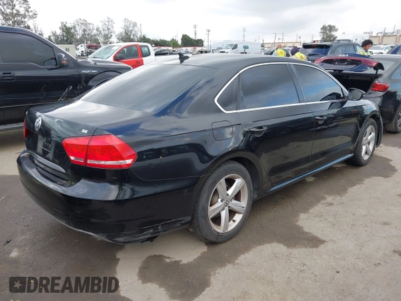 2012 Volkswagen Passat SE with VIN 1VWBP7A31CC047883, listed as a IAAI auction lot 42130138 with 142,017 mi miles. Bid and sale history available at carsss.com. Image 4.