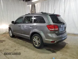 2013 Dodge Journey Crew with VIN 3C4PDCCG2DT706716, listed as a Copart auction lot 67118723 with 167,151 mi miles and Salvage title. Bid and sale history available at DreamBid. Image 2.