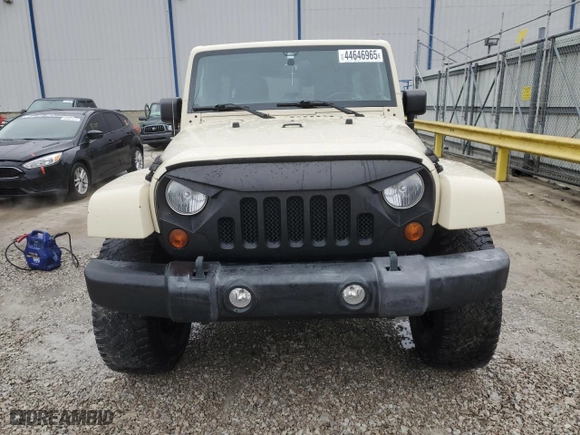 2011 Jeep Wrangler Unlimited Sahara with VIN 1J4BA5H19BL562457, listed as a Copart auction lot 44646965 with 184,155 mi miles and Salvage Title. Bid and sale history available at carsss.com. Image 5.