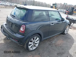 2013 MINI Hardtop S with VIN WMWSV3C50DT394345, listed as a IAAI auction lot 41738216 with 58,241 mi miles and . Bid and sale history available at DreamBid. Image 4.