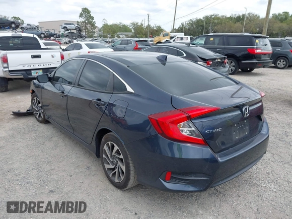 2018 Honda Civic EX with VIN 19XFC2F75JE035935, listed as a IAAI auction lot 41795110 with 92,687 mi miles and . Bid and sale history available at DreamBid. Image 3.