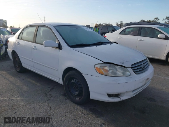 2004 Toyota Corolla CE with VIN JTDBR32E042025208, listed as a IAAI auction lot 41934485 with 299,999 mi miles. Bid and sale history available at carsss.com. Image 1.