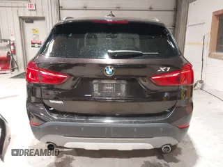 2016 BMW X1 xDrive28i with VIN WBXHT3C33GP886935, listed as a IAAI auction lot 41707367 with 73,201 mi miles. Bid and sale history available at carsss.com. Image 17.