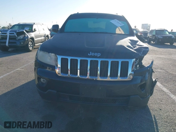 2013 Jeep Grand Cherokee Laredo with VIN 1C4RJEAG2DC643290, listed as a IAAI auction lot 41751696 with 125,258 mi miles. Bid and sale history available at carsss.com. Image 12.