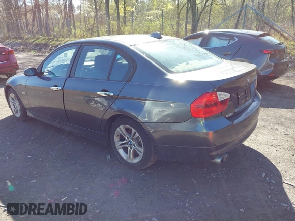 2008 BMW 3 Series 328xi with VIN WBAVC93518K043073, listed as a IAAI auction lot 42134507 with 148,712 mi miles. Bid and sale history available at carsss.com. Image 3.