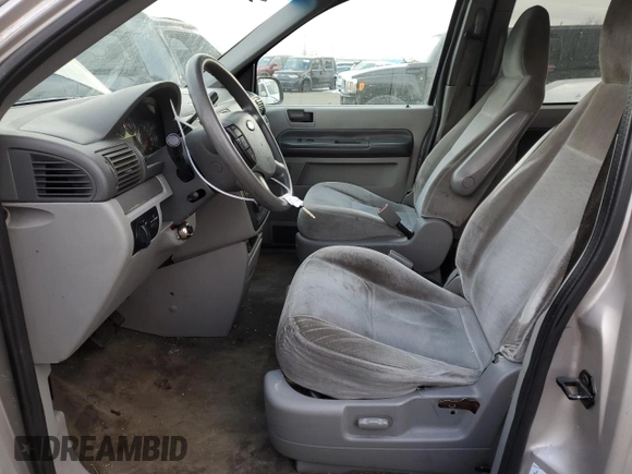 2005 Ford Freestar SE z VIN 2FMZA51665BA67613, wystawiony jako Copart lot #43418315 z przebiegiem Nie podano mil oraz Nie do naprawy. Historia ofert i sprzedaży dostępna na DreamBid. Obrazek 7.