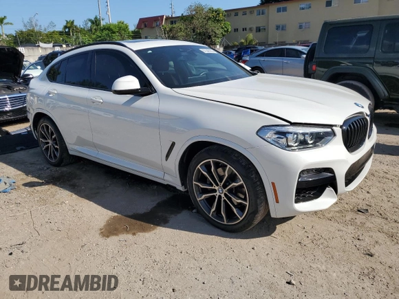 2021 BMW X4 xDrive30i with VIN 5UX2V1C0XM9E11002, listed as a Copart auction lot 67348653 with 27,805 mi miles. Bid and sale history available at carsss.com. Image 4.