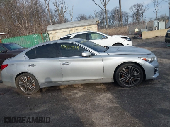 2015 Infiniti Q50 Premium z VIN JN1BV7AR8FM417712, wystawiony jako IAAI lot #41427839 z przebiegiem 88 424 mil mil oraz . Historia ofert i sprzedaży dostępna na DreamBid. Obrazek 12.