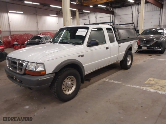 1999 Ford Ranger XLT with VIN 1FTZR15X0XPA27211, listed as a IAAI auction lot 41688344 with 207,370 mi miles. Bid and sale history available at carsss.com. Image 2.