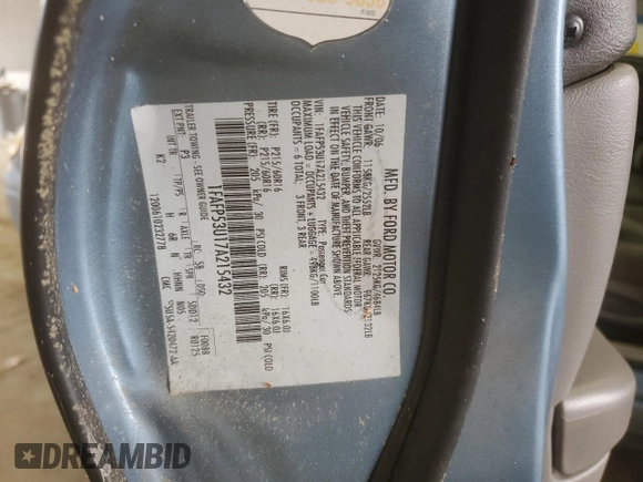 2007 Ford Taurus SE with VIN 1FAFP53U17A215432, listed as a Copart auction lot 64029215 with 121,190 mi miles and Salvage title. Bid and sale history available at DreamBid. Image 12.