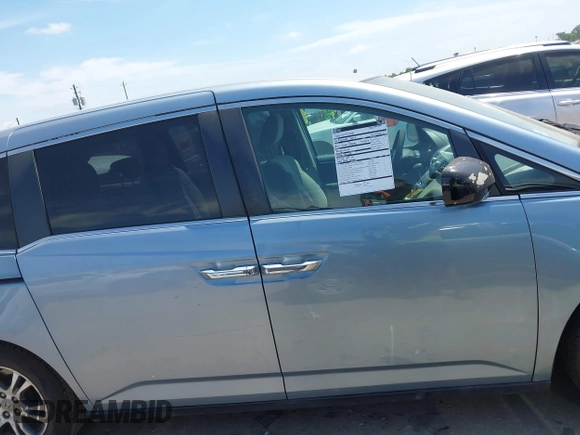 2013 Honda Odyssey EX z VIN 5FNRL5H4XDB062760, wystawiony jako IAAI lot #42063899 z przebiegiem 181 658 mil mil oraz . Historia ofert i sprzedaży dostępna na DreamBid. Obrazek 14.
