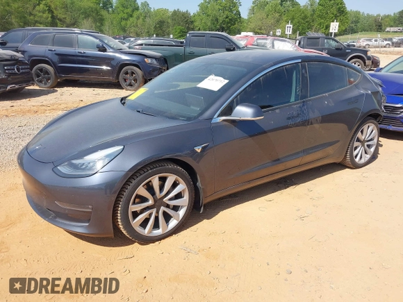 2018 Tesla Model 3 Long Range Battery z VIN 5YJ3E1EBXJF121183, wystawiony jako IAAI lot #42070712 z przebiegiem 71 823 mil mil oraz . Historia ofert i sprzedaży dostępna na DreamBid. Obrazek 19.