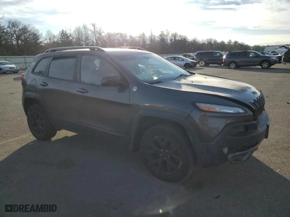 2015 Jeep Cherokee Trailhawk with VIN 1C4PJMBB0FW719904, listed as a Copart auction lot 88491845 with 143,550 mi miles and Non Repairable. Bid and sale history available at carsss.com. Image 4.