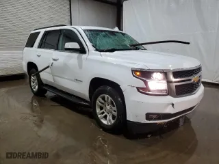 2019 Chevrolet Tahoe LT with VIN 1GNSKBKC3KR307481, listed as a Copart auction lot 82666844 with 106,309 mi miles and Salvage Title. Bid and sale history available at carsss.com. Image 4.