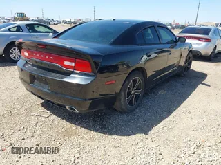 2012 Dodge Charger SE with VIN 2C3CDXBG2CH117670, listed as a IAAI auction lot 41996499 with 233,633 mi miles. Bid and sale history available at carsss.com. Image 4.