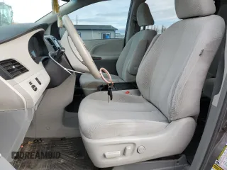 2014 Toyota Sienna LE with VIN 5TDJK3DC7ES073648, listed as a Copart auction lot 50554095 with 136,236 mi miles and Salvage Title. Bid and sale history available at DreamBid. Image 7.