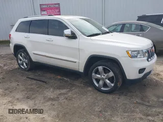2012 Jeep Grand Cherokee Overland with VIN 1C4RJECT5CC362349, listed as a IAAI auction lot 41760221 with 218,350 mi miles. Bid and sale history available at carsss.com. Image 1.